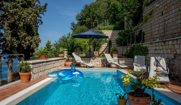 Private pool overlooking the sea in the Modern seafront villa for family holiday in Dubrovnik
