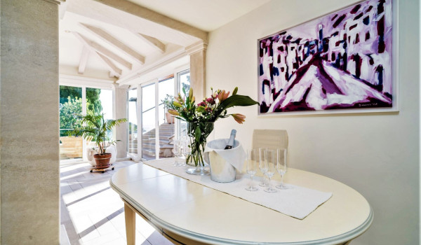 Champagne on the dining table of the luxury beachfront villa for family vacation at the beach in Dubrovnik