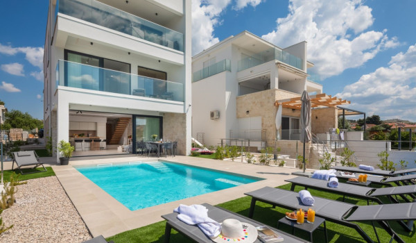 View of the exterior of a luxurious Croatian private villa for rent and vacation in the heart of Dalmatia
