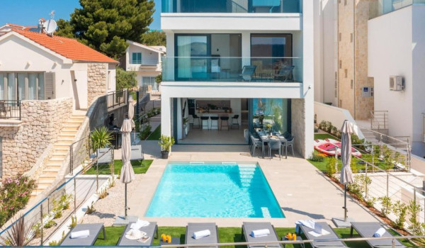 View of the exterior of a luxurious Croatian private villa for rent and vacation in the heart of Dalmatia