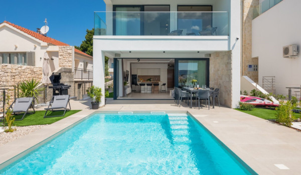 View of the exterior of a luxurious Croatian private villa for rent and vacation in the heart of Dalmatia