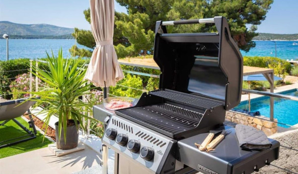 BBQ grill on the property of the Croatian luxury private villa L'Amour for rent and vacation