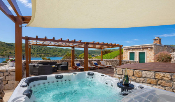 Hot tub on terrace of Croatian seafront luxury villa Vis for total privacy and rent.