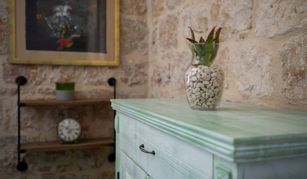 Playfuly decorated bedroom in seafront villa on Vis with jacuzzi for vacation and rent.