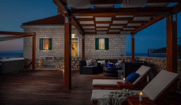 Terrace with outdoor furniture in luxury private villa Lighthouse Ligero on Vis for vacation and rent.