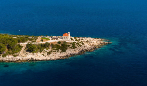 Panoramic view of Vis luxury holiday villa Lighthouse Ligero by the sea for vacation and rent.