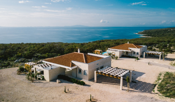 View of the private property of the luxury villa Summer Dream Privacy Novalja with swimming pool, jacuzzi, sauna and private parking for 7 people by the sea and the beach on the island of Pag