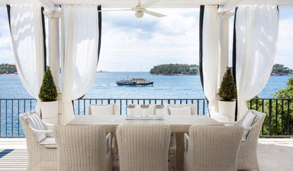 Private dining area on the terrace of the luxury vacation villa by the sea