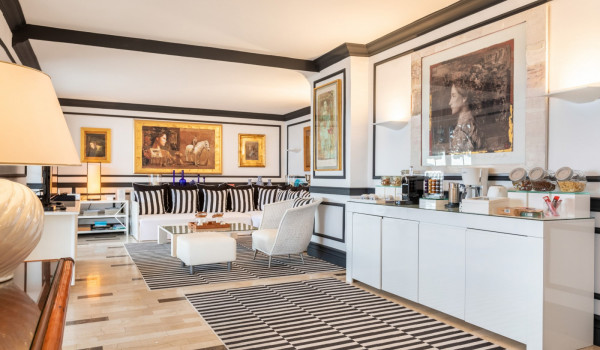 Living room with big comfortable sofa and coffee station in the luxury beachfront villa Sea Diamant in Dubrovnik