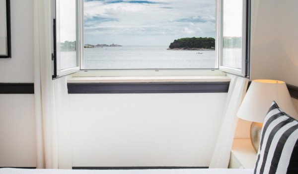 Bedroom with sea view in the family villa for rent and vacation in Dubrovnik