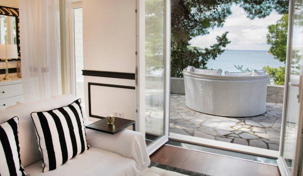 Bedroom with direct entrance to the terrace of the modern vacation villa in Dubrovnik