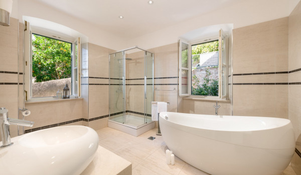 Bathroom of the luxury villa in Dalmatia Dubrovnik Stone Beauty with designer bathtub and shower cabin
