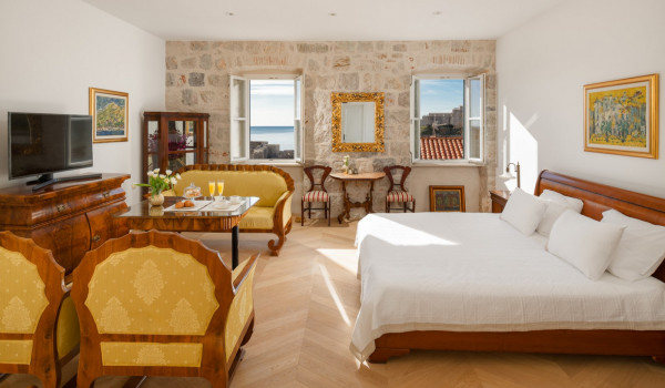 Bedroom of Croatia luxury pool villa with king-size bed and SMART TV for vacation with family
