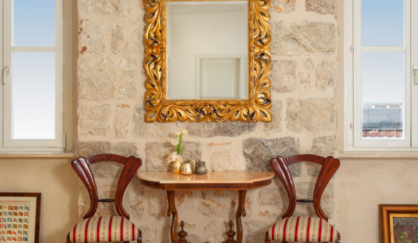 Antique seating area in a traditional bedroom of Croatia luxury holiday villa