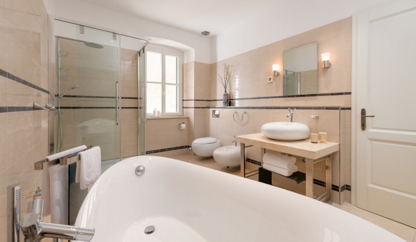 Bathroom of the luxury villa in Dalmatia Dubrovnik Stone Beauty with designer bathtub and shower cabin