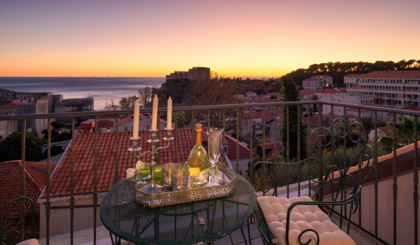 Private balcony of Croatia luxury pool villa with seating area and sea view perfect for family vacation
