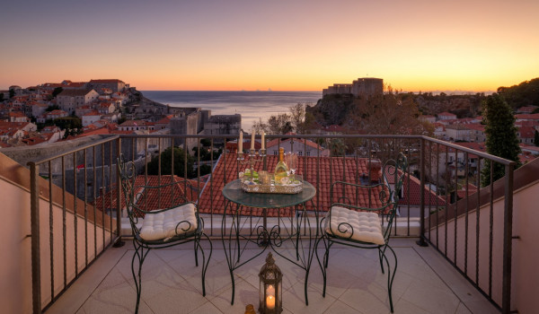 Private balcony of Croatia luxury pool villa with seating area and sea view perfect for family vacation