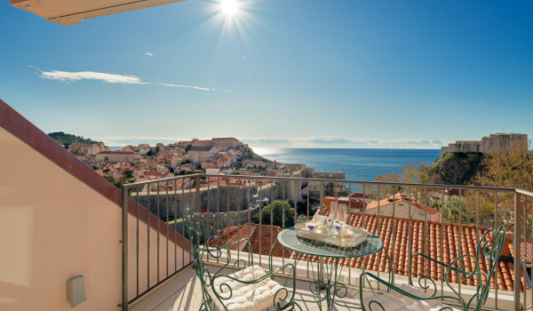 Private balcony of Croatia luxury pool villa with seating area and sea view perfect for family vacation