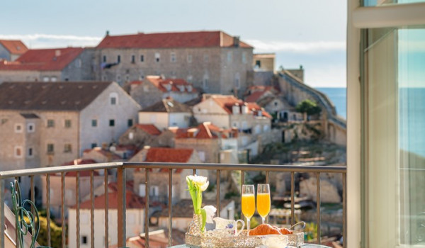 Private balcony of Croatia luxury pool villa with seating area and sea view perfect for family vacation