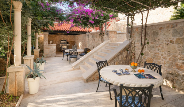 Dining table on the terrace of Croatia luxury pool villa for vacation and rent with friends and family