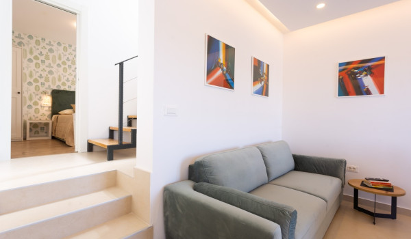 Dining area and living room in a family villa Sea Hug with private pool