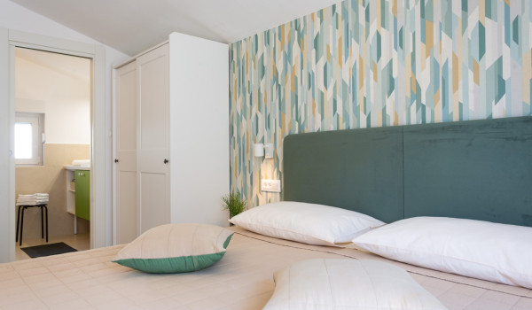 Wardrobe in a double bedroom of a family villa with private pool