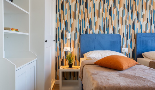 Twin beds in a room of a Luxury family villa Sea Hug