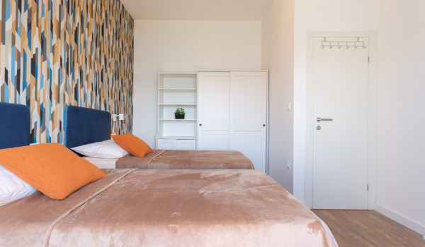 Twin beds in a room of a Luxury family villa Sea Hug