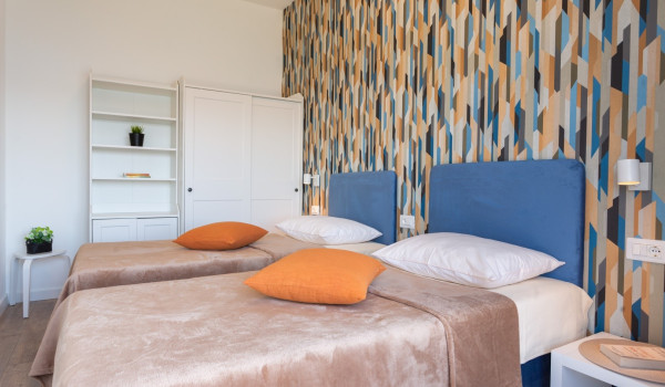 Twin beds in a room of a Luxury family villa Sea Hug