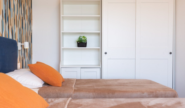 Twin beds in a room of a Luxury family villa Sea Hug