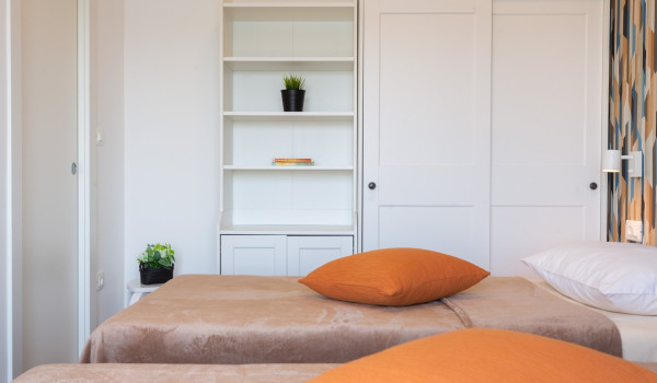 Twin beds in a room of a Luxury family villa Sea Hug