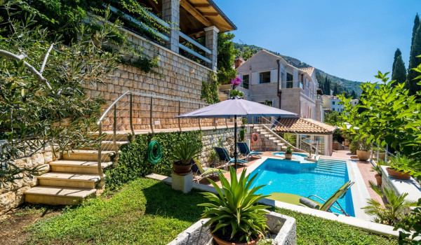 Terrace with private pool and jacuzzi of Croatia luxury villa for family vacation by the sea
