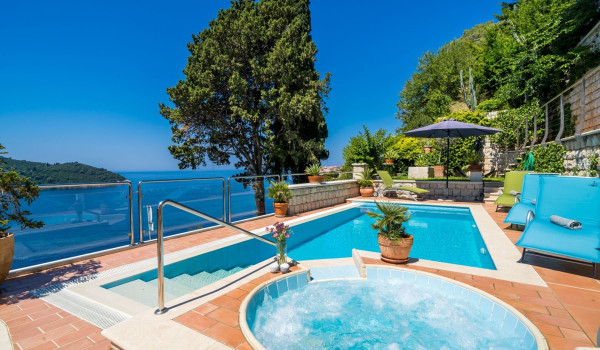 Terrace with private pool and jacuzzi of Croatia luxury villa for family vacation by the sea