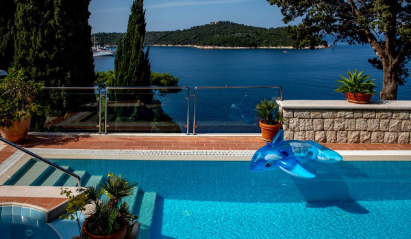 Private pool overlooking the sea in the Modern seafront villa for family holiday in Dubrovnik