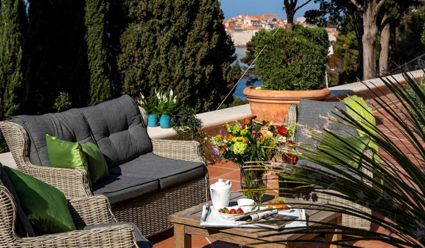 Seating area on the terrace of the luxury vacation villa at the beach in Dubrovnik
