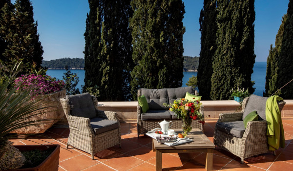 Seating area on the terrace of the luxury vacation villa at the beach in Dubrovnik
