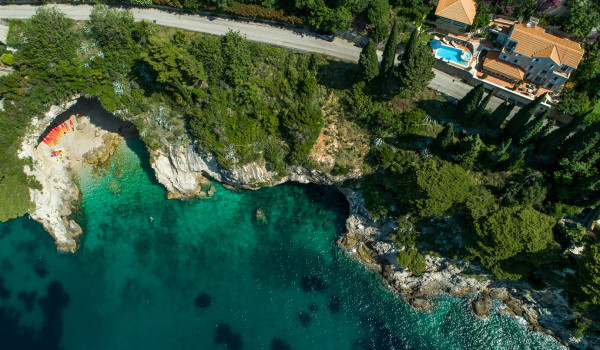 Aerial view of the luxury beachfront villa Dubrovnik Palace with private pool and jacuzzi in Dubrovnik