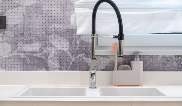 A sink in the modern kitchen on the ground floor of the luxury villa with pool