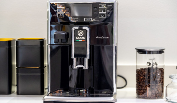 Coffee and coffee machine in the modern kitchen of the newly built villa in the vicinity of Split