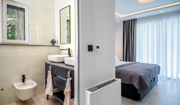 Private en suite bathroom in the modern bedroom in the newly built villa with pool near Split