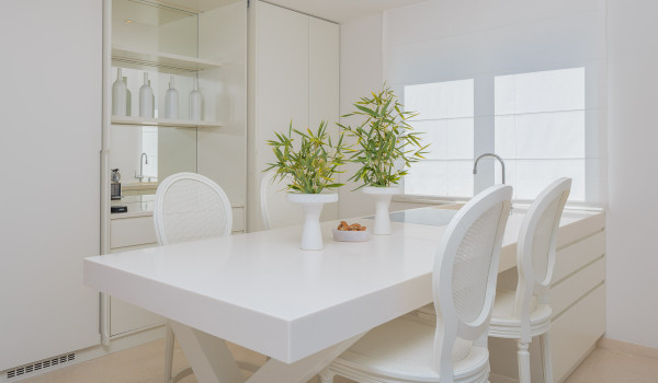 Kitchen and dining table with high chairs in the luxury pool villa Primosten Glamour with concierge service for vacation