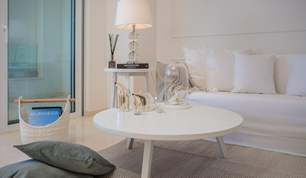 Living room with comfortable white sofa and coffee table in the luxury Croatia villa with pool Primosten Glamour