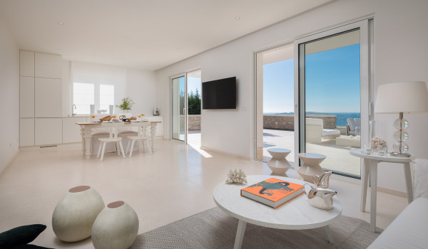 The interior of Croatia luxury villa Primosten Glamour with living room, dining room and private exit to the balcony