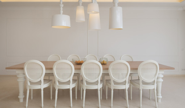 Wooden dining table with ten chairs in the dining room in the luxury Dalmatia villa Primosten Glamour