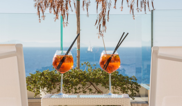 A refreshing drink served on the outdoor terrace with sea view in the luxury pool villa Primosten Glamour for vacation and rent