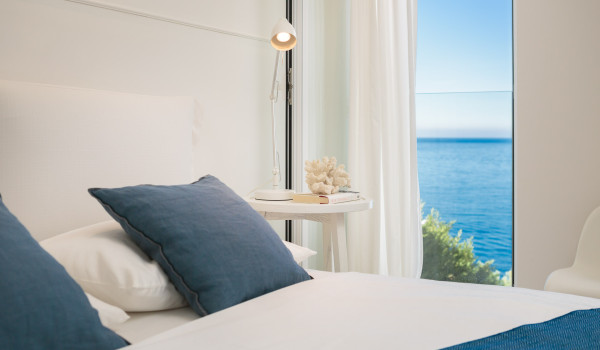 Sea view from the bedroom of Croatia luxury family villa with double bed for vacation and rent in Primosten
