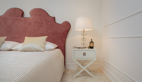 Bedroom of Croatia luxury pool villa Primosten Glamour with double-size bed and night stand with lamp for rent