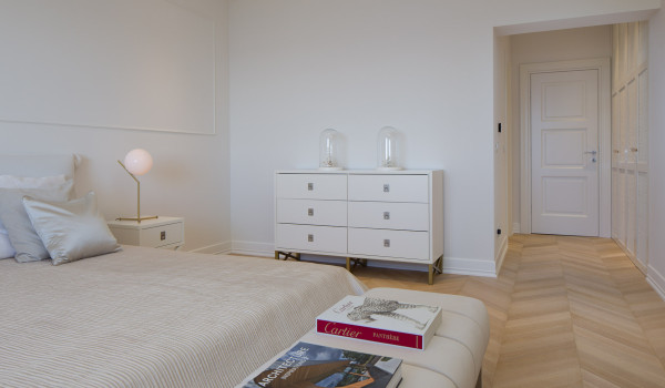 Bedroom of Croatia luxury pool villa with double-size bed and night stand with lamp for vacation and rent in Primosten