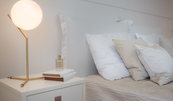 Bedroom of Croatia luxury holiday villa with double-size bed decorated with white pillows for rent in Primosten