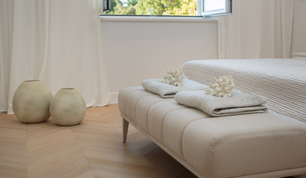 Stools and decorative vases in the bedroom of Croatia luxury vacation villa with private gym in Primosten